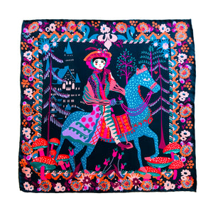 Silk pocket square designed by Crimson Rose featuring an original illustration of a knight riding a horse in a forest with a castle in the background by Crimson Rose O'Shea. Colours are deep blue, greens, reds, pinks and oranges.