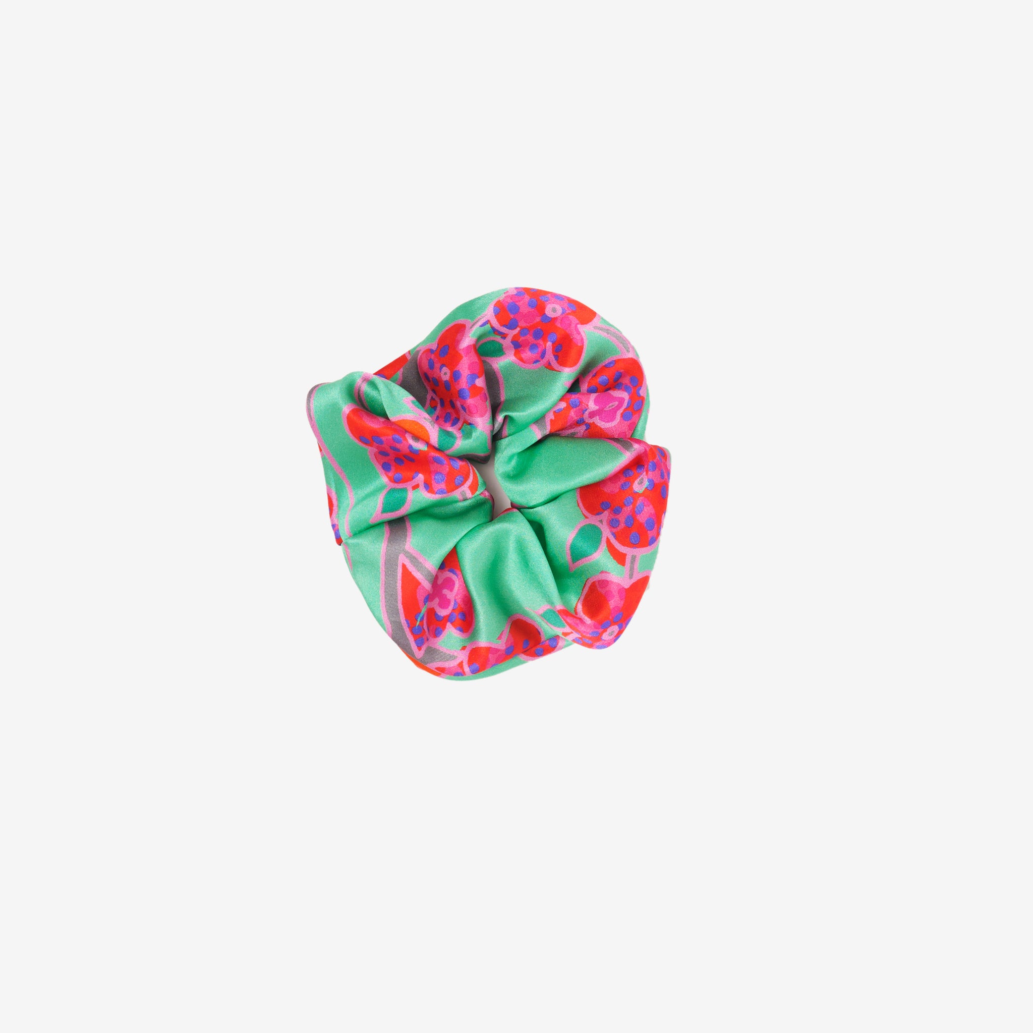 Crimson Rose scrunchie featuring hand drawn flower print from the Island Dreams collection in green, red, pink, purple and grey.