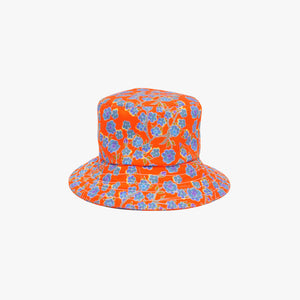 Crimson Rose bucket hat with orange and blue floral print. Photography Rowan Corr.
