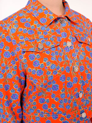 Close up details of the Crimson Rose cropped cotton drill jacket with orange and blue floral print. Photography Rowan Corr.